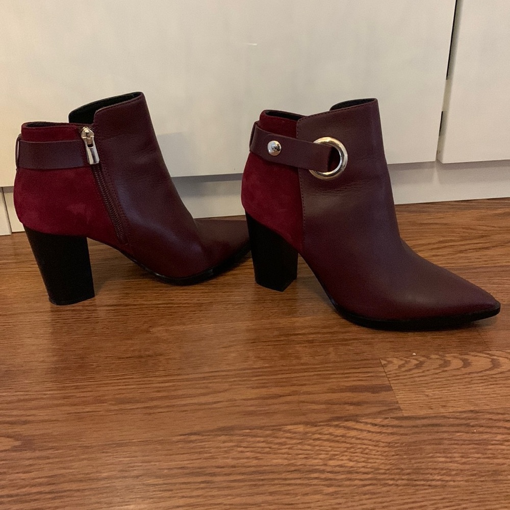 Burgundy boots with gold accents